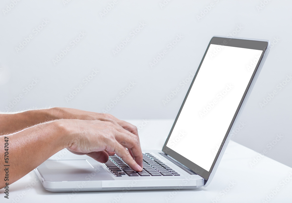 Man hands with white screen laptop clipping path Man hands with white screen laptop clipping path