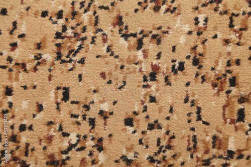 Brown surface with spots.
