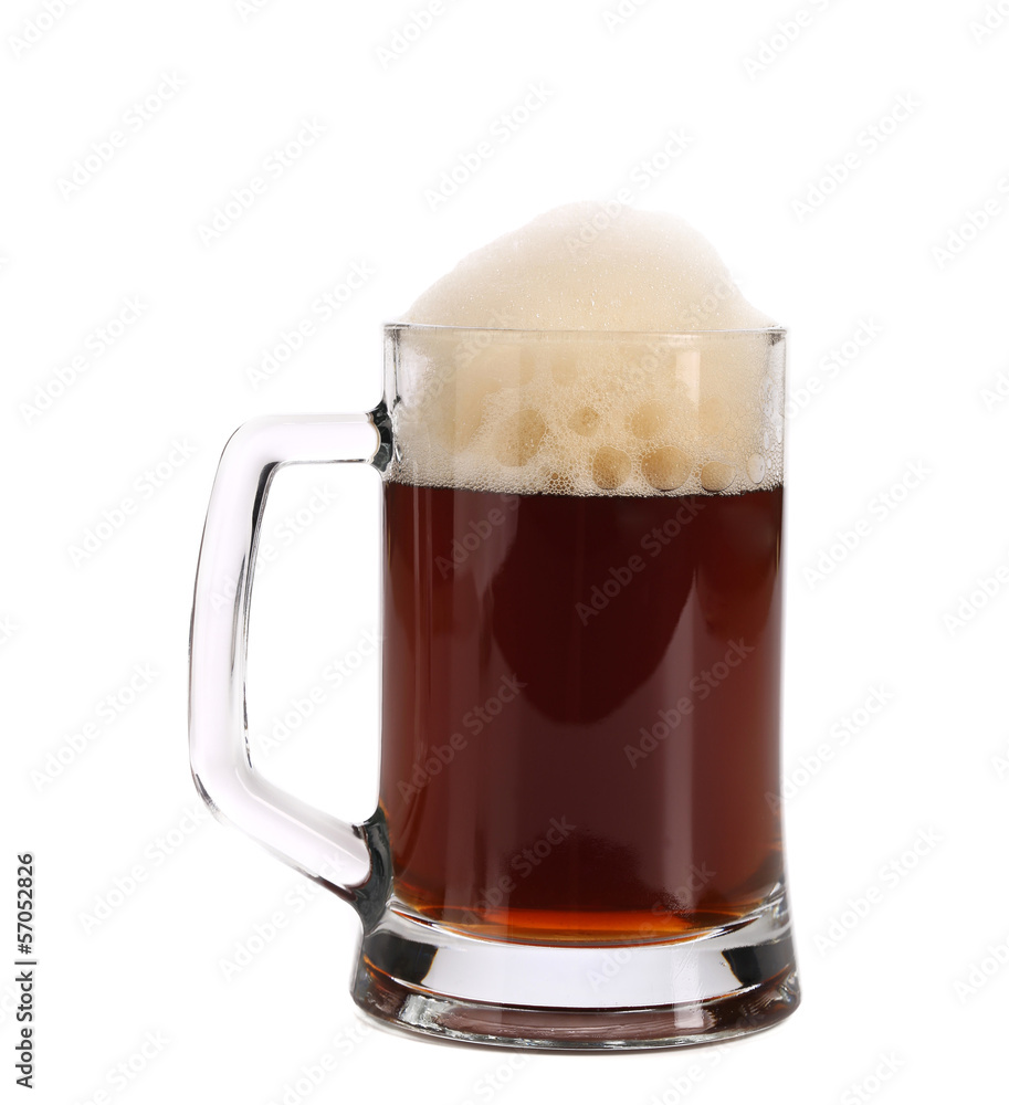 Cold dark beer in glass. Cold dark beer in glass.