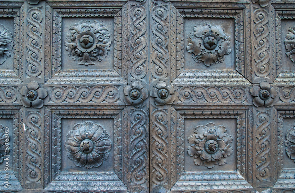Old door with wooden decorations