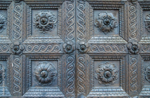 Old door with wooden decorations