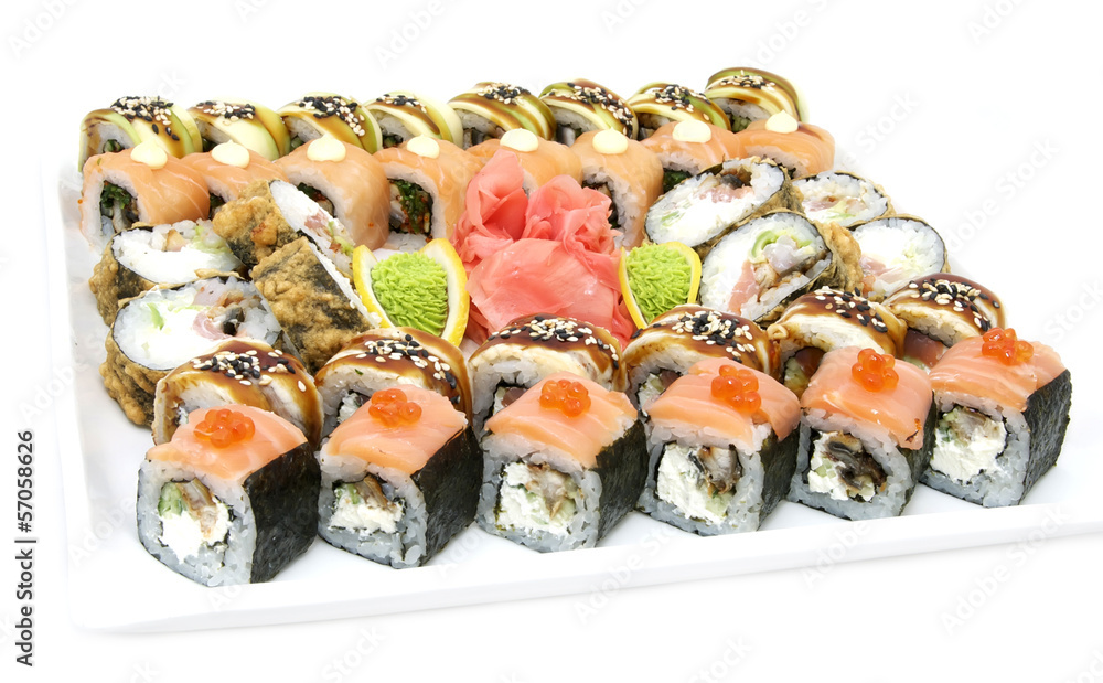 Japanese rolls in a restaurant with fish and vegetables Japanese rolls in a restaurant with fish and vegetables