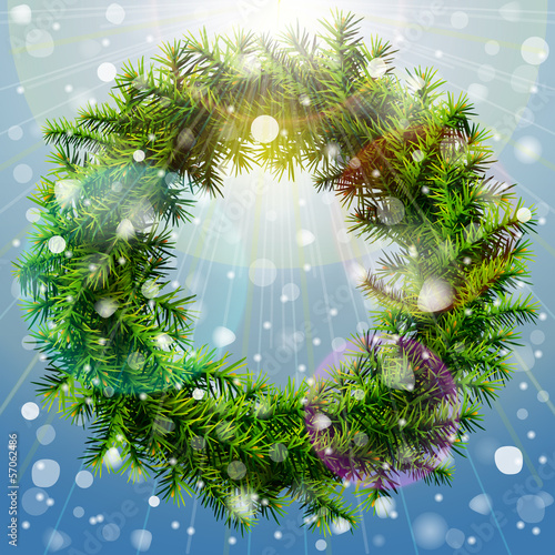 Christmas wreath with overhead lighting and snowfall