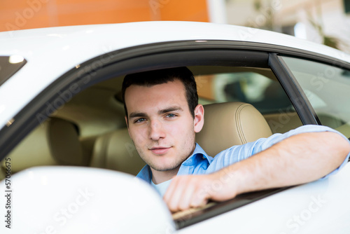 portrait of a man in a car