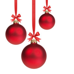 three red christmas balls hanging on ribbon with bows