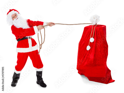 Santa pulling gifts sack