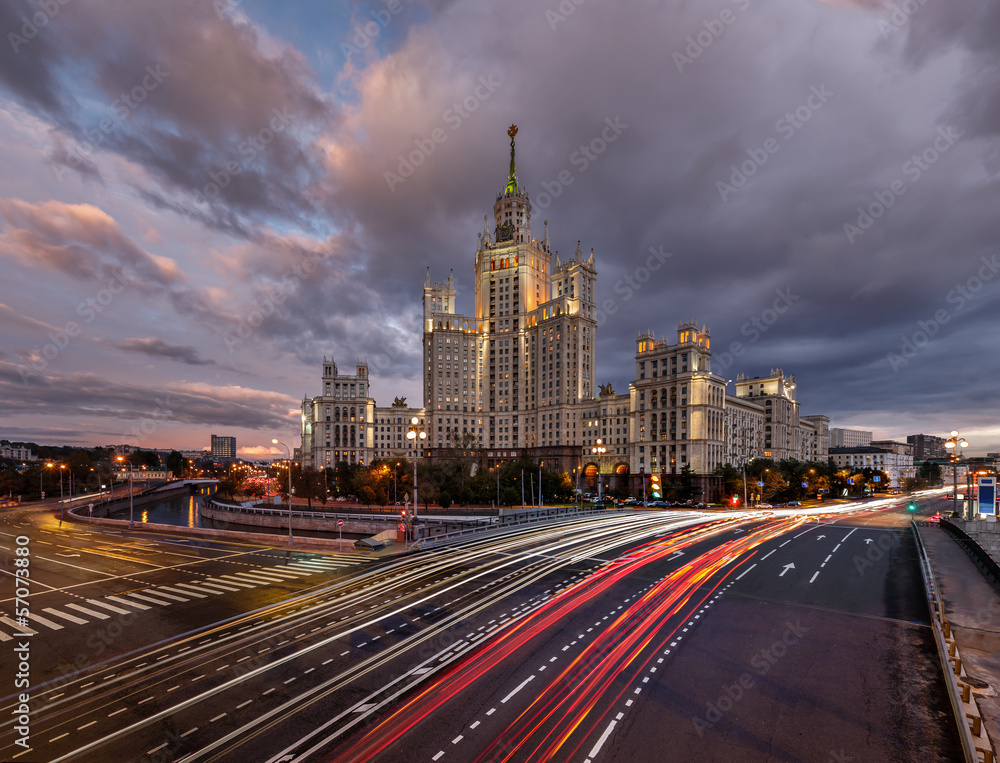 Fototapeta premium Skyscraper on Kotelnicheskaya Embankment and Traffic Trails at D