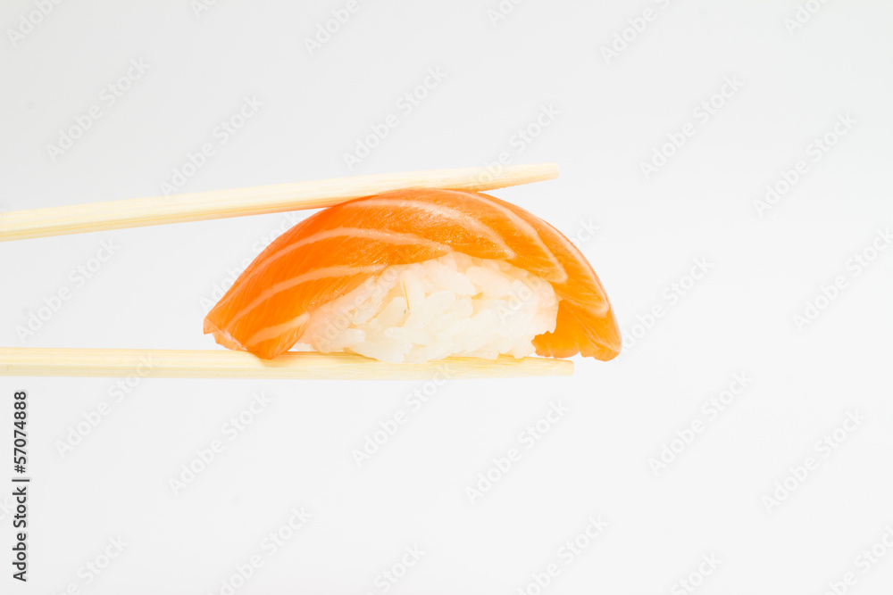 Salmon sushi nigiri with chopsticks Salmon sushi nigiri with chopsticks