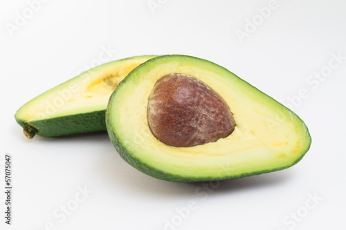 Sliced avocado on white background