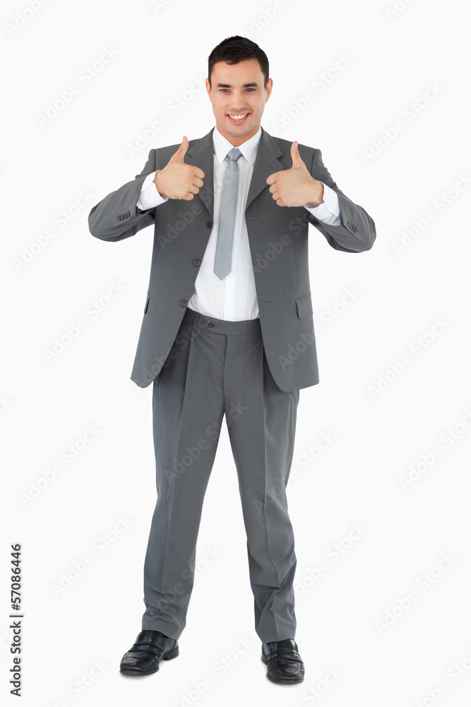 Young businessman giving approval Young businessman giving approval
