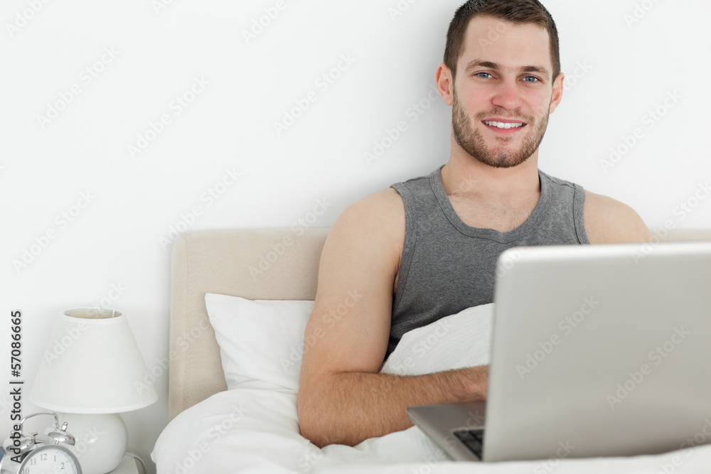 Handsome man using a laptop Handsome man using a laptop