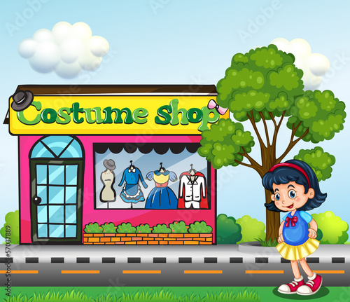 A small girl across the costume shop