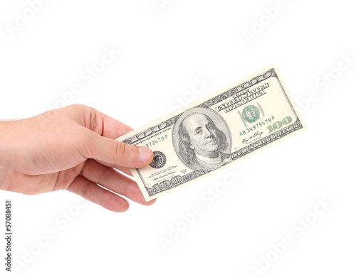 Male hand holding 100 Dollar bill.