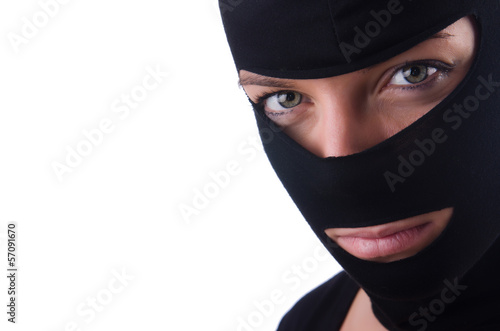 Canvastavla Young female burglar isolated on white