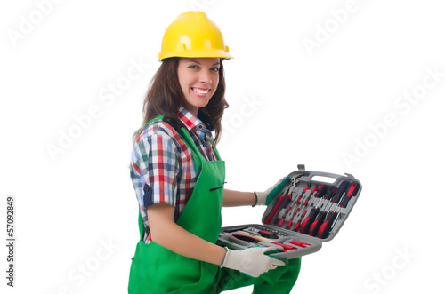 Young woman with toolkit on white