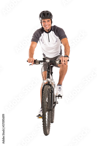 Young Male Cyclist On Bicycle