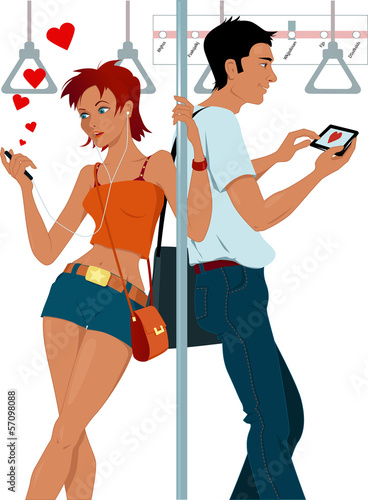 Young couple sexting on a subway