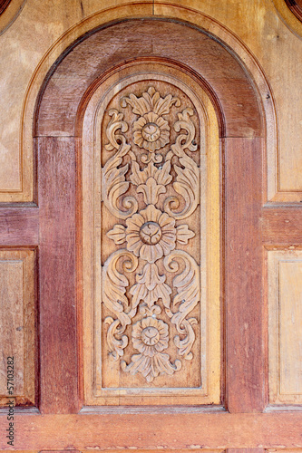 Form of art, carved wooden doors of Thailand.