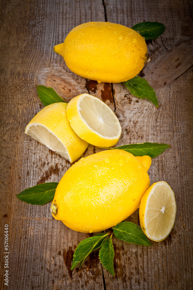 Fresh lemons on wooden table, top view 