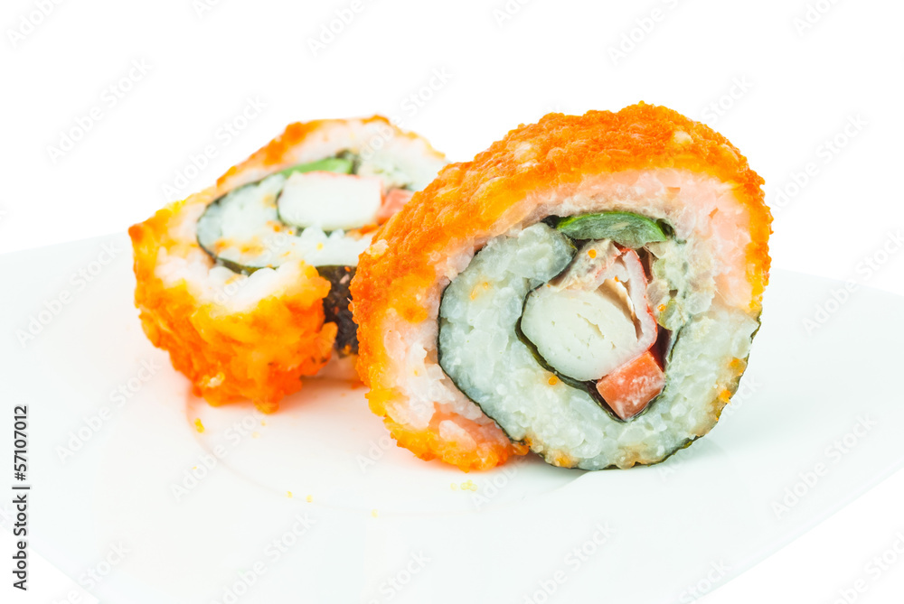 Delicious California rolls on dish Delicious California rolls on dish