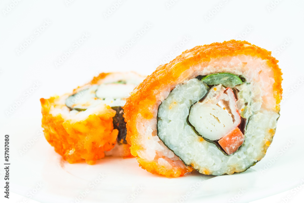 Delicious California rolls on dish Delicious California rolls on dish