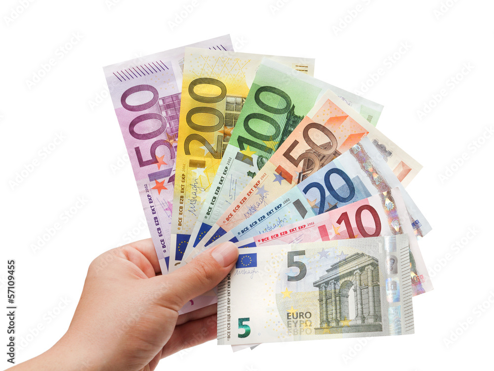 euro banknotes in hand on white￼ - obrazy, fototapety, plakaty 