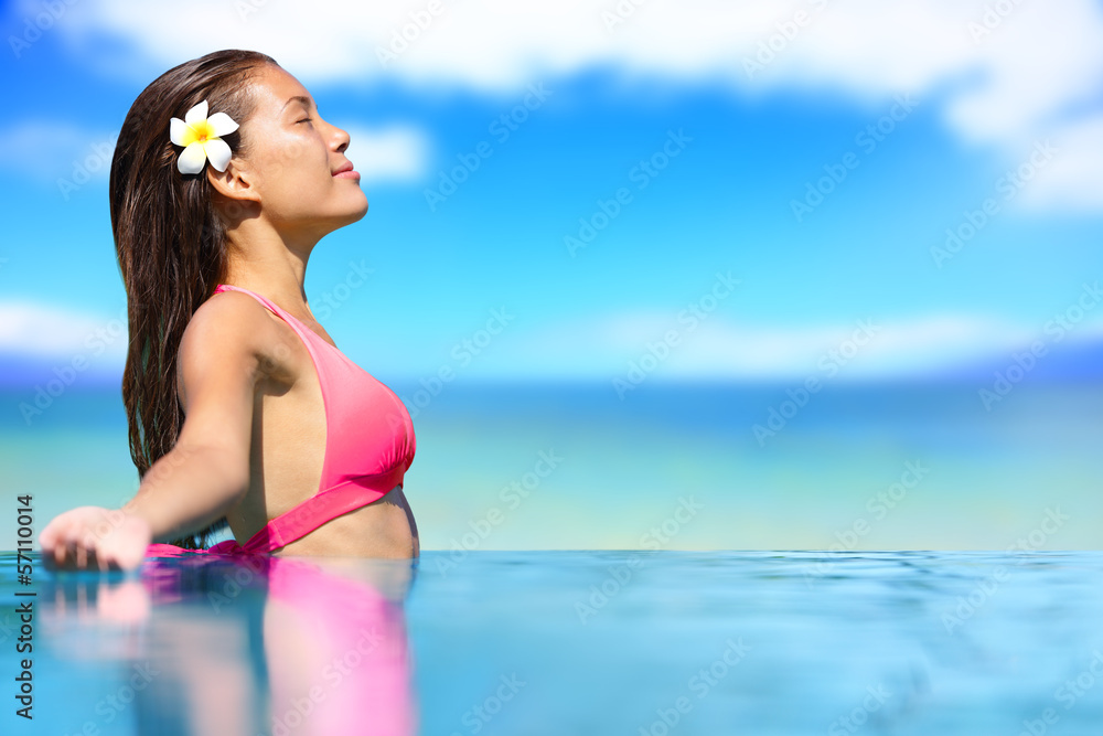Spa vacation retreat woman relaxing at travel resort Spa vacation retreat woman relaxing at travel resort