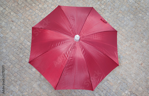 Red umbrella outdoors, season concept