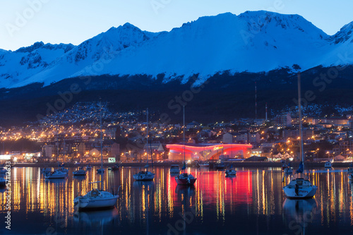 A night view of Ushuaia, Tierra del Fuego. Boats line the harbor