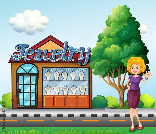 A woman standing  across the jewelry shop