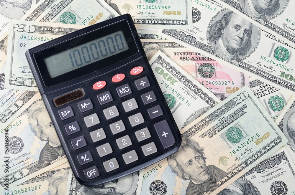 calculator on dollar background - business concept calculator on dollar background - business concept