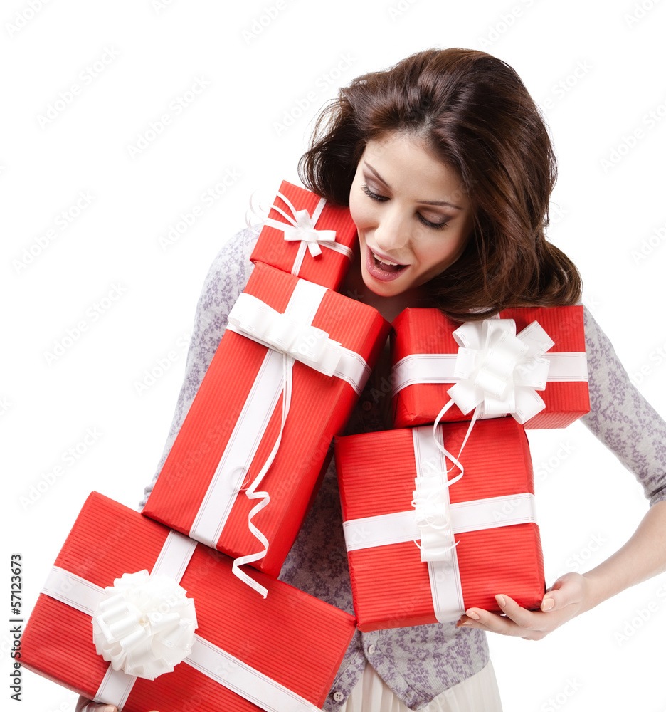 Pretty woman hands a number of boxes with presents, isolated Pretty woman hands a number of boxes with presents, isolated