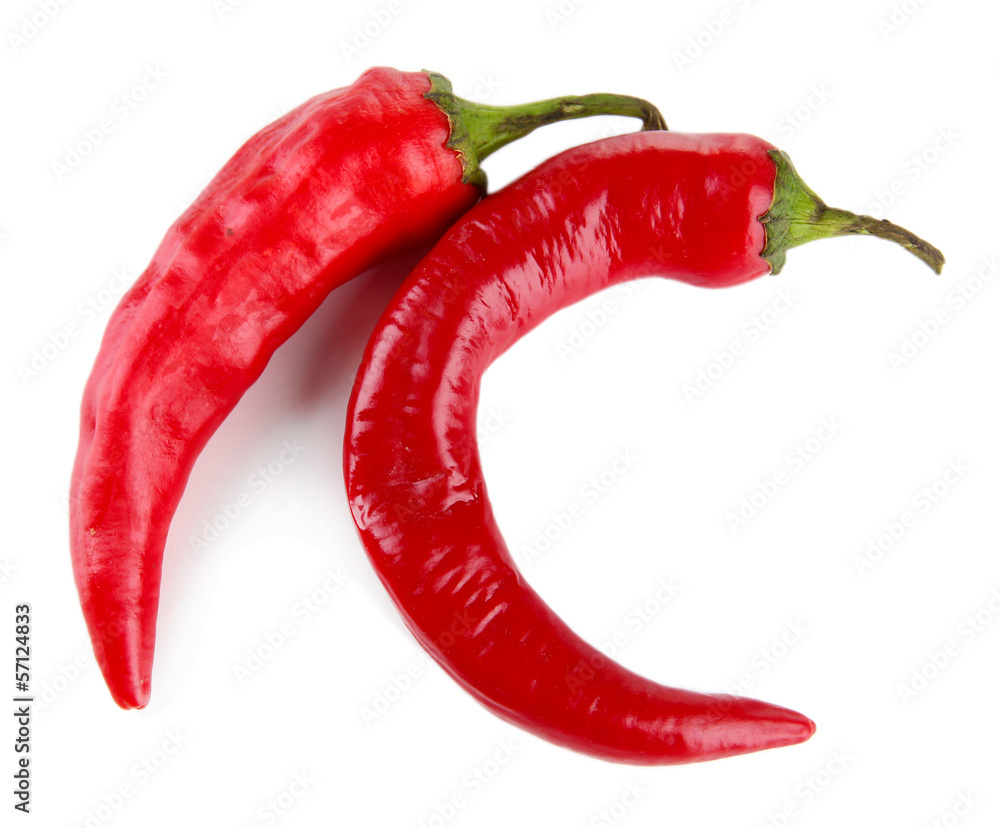 Two red hot chili peppers isolated on white Two red hot chili peppers isolated on white