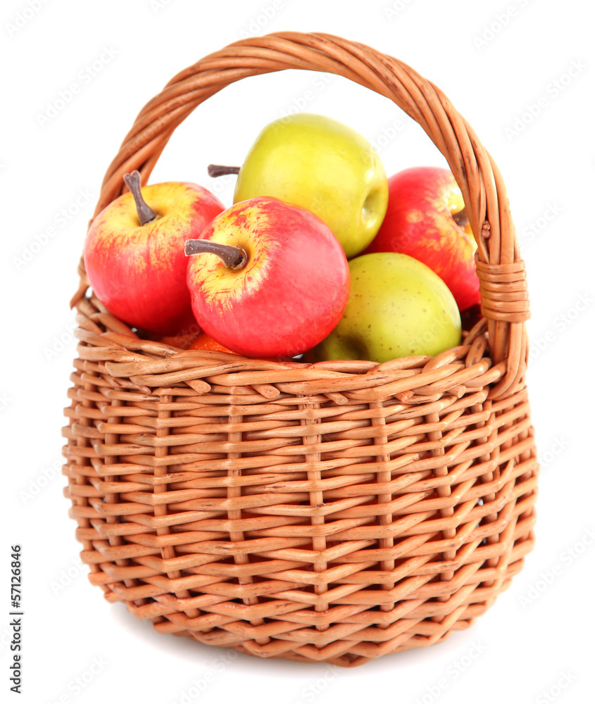Small apples in wicker basket, isolated on white Small apples in wicker basket, isolated on white