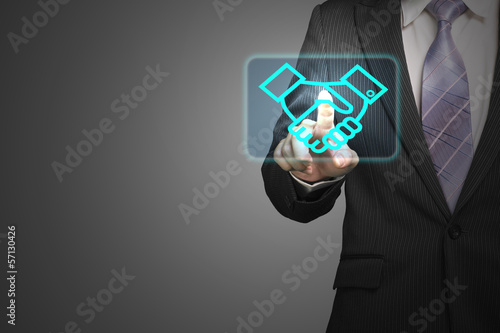 Businessman touch shake hand icon in space  deal via internet  o