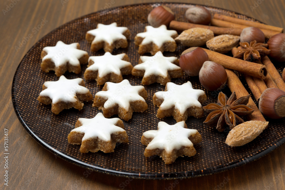 Christmas cookies and spices on a plate, close-up Christmas cookies and spices on a plate, close-up