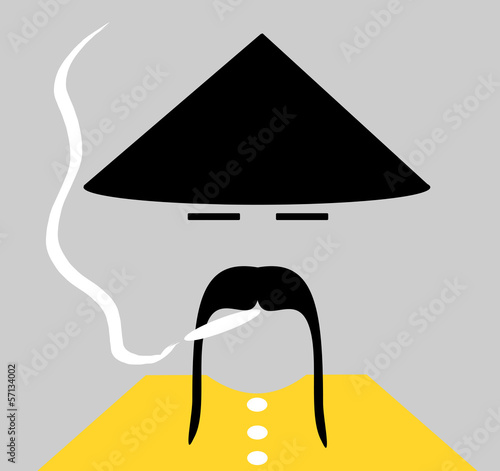 asian man wearing traditional conical hat and smoking