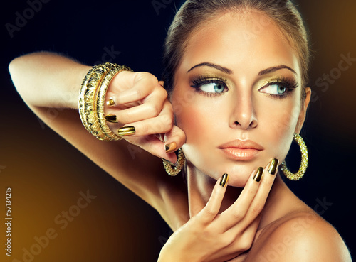 The girl with the Golden makeup and metal nails. #57134215