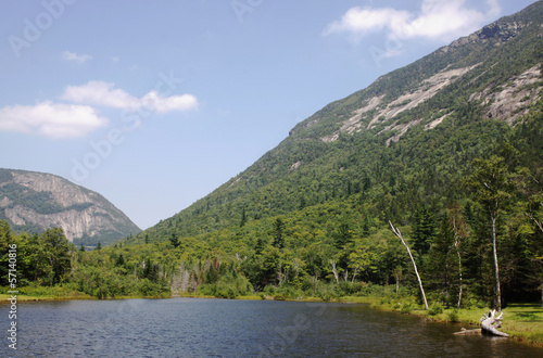 Willey pond in New Hampshire, USA bordered by Mount Willey (left) and Mount Webster (right). photo