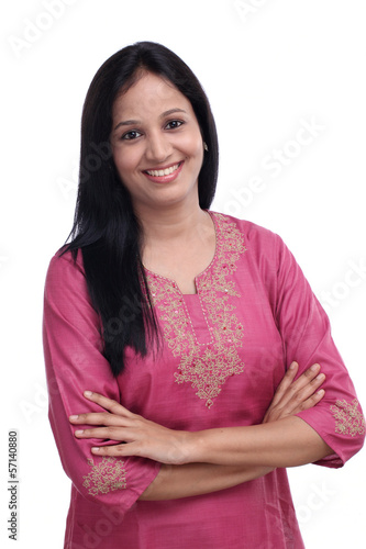 Portrait of young Indian woman against white