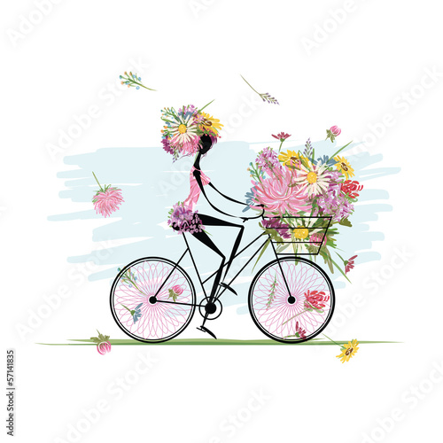 Girl with floral bouquet in basket cycling © Kudryashka