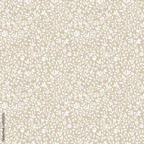 Seamless pattern with silhouette of small flowers