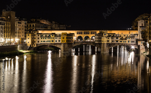 Arno river and Ponte Vecchio in Florence at night © pavel068