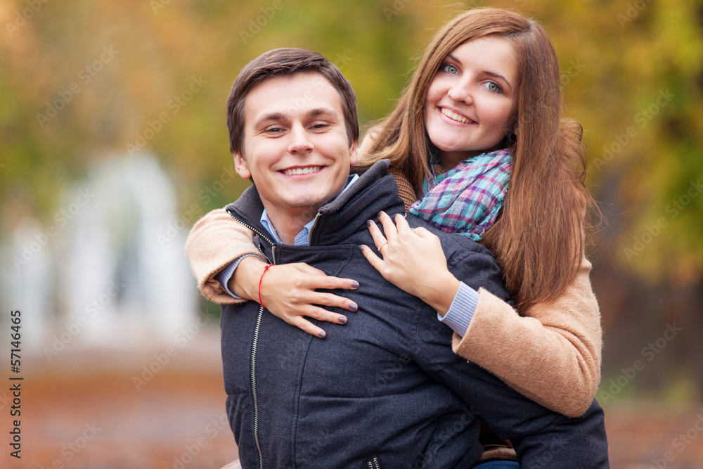 Teen couple in the autumn park Teen couple in the autumn park