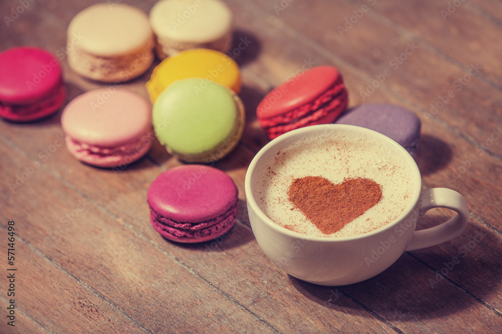 macrons with cup of coffee macrons with cup of coffee