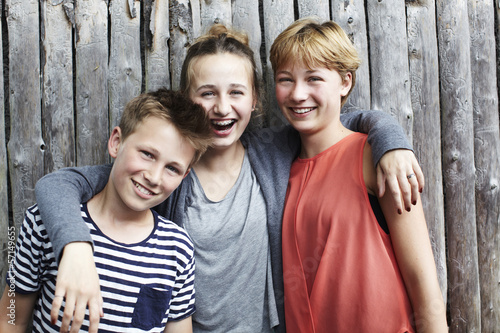 Portrait of three siblings