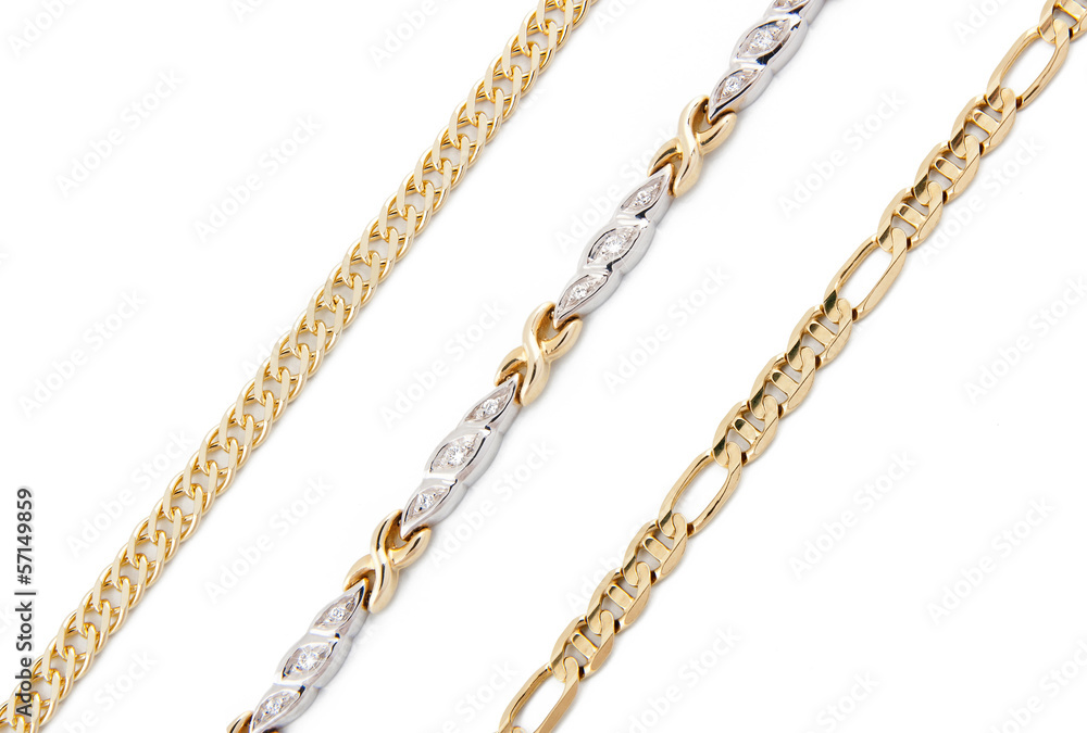 Gold jewelry on a white background