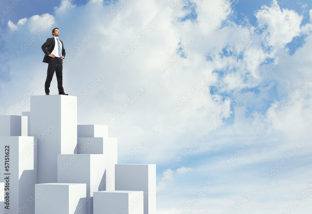 Man standing on highest cube
