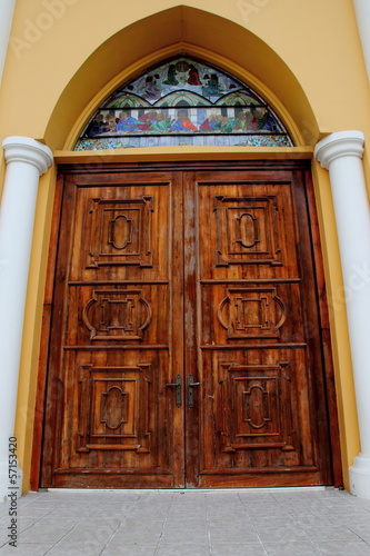 Old wooden church door, Christ.