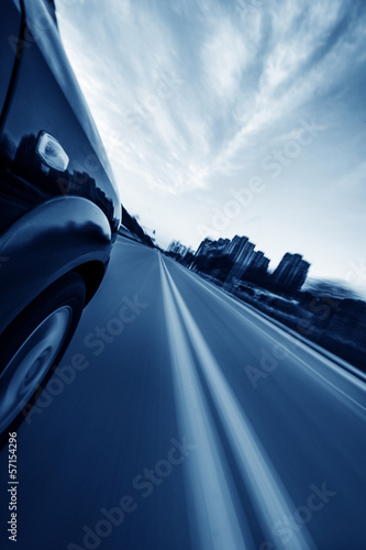 car on the road with motion blur background © hxdyl